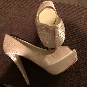 Tan satin pumps with rhinestones